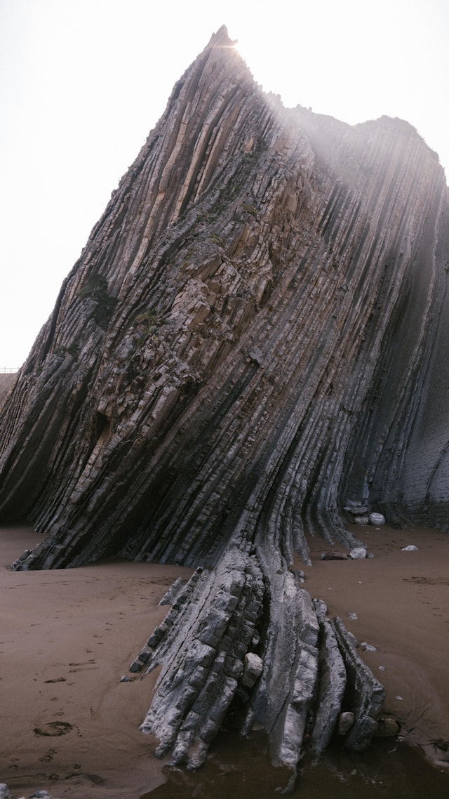 The Flysch Route on the Basque Coast features rugged cliffs showcasing millions of years of geology.