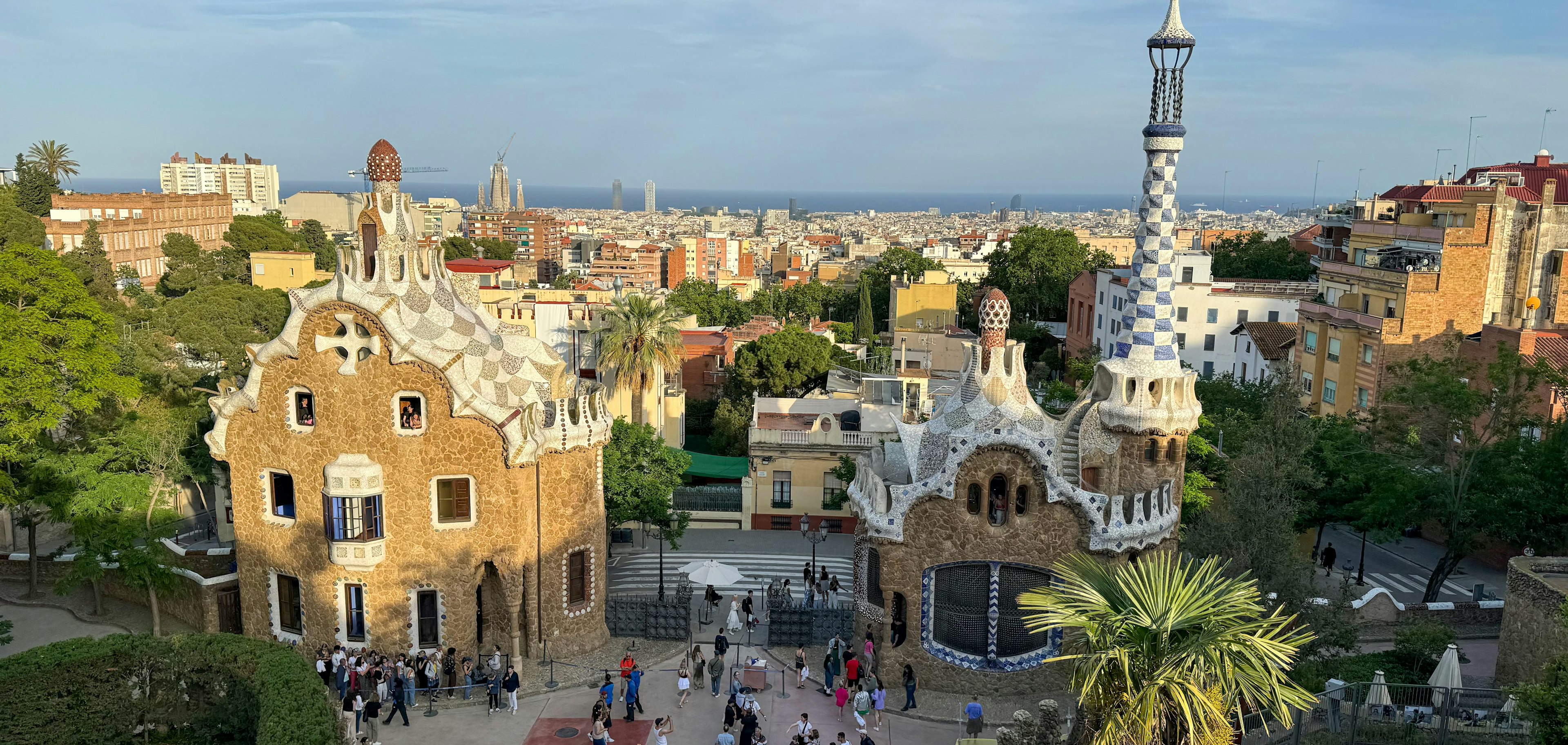 Park Güell is known for its unique architectural elements, colorful mosaic-covered structures, and organic shapes that reflect architect Antoni Gaudí's distinctive style.