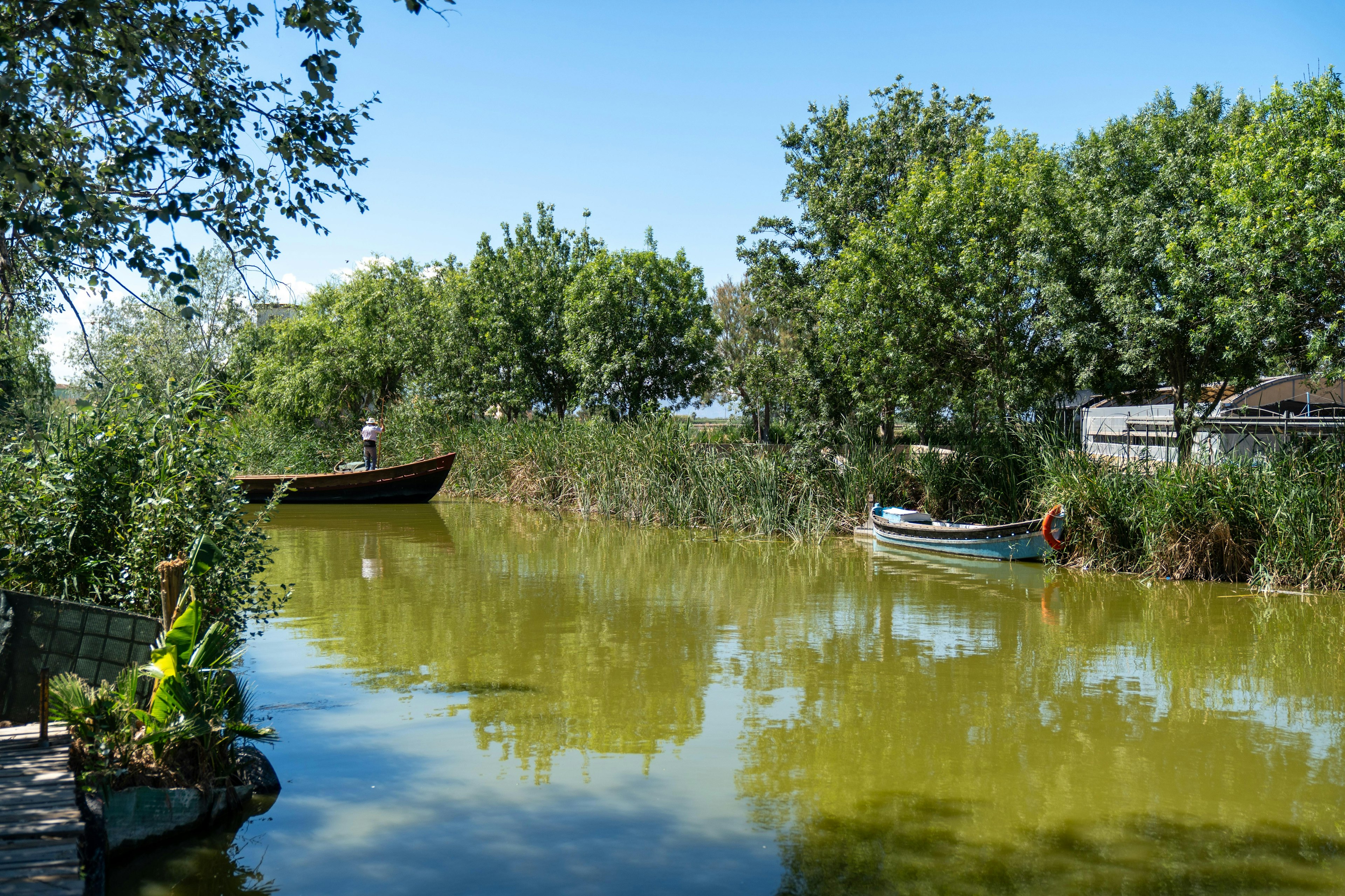 The Albufera Natural Park features a freshwater lagoon and surrounding wetlands.