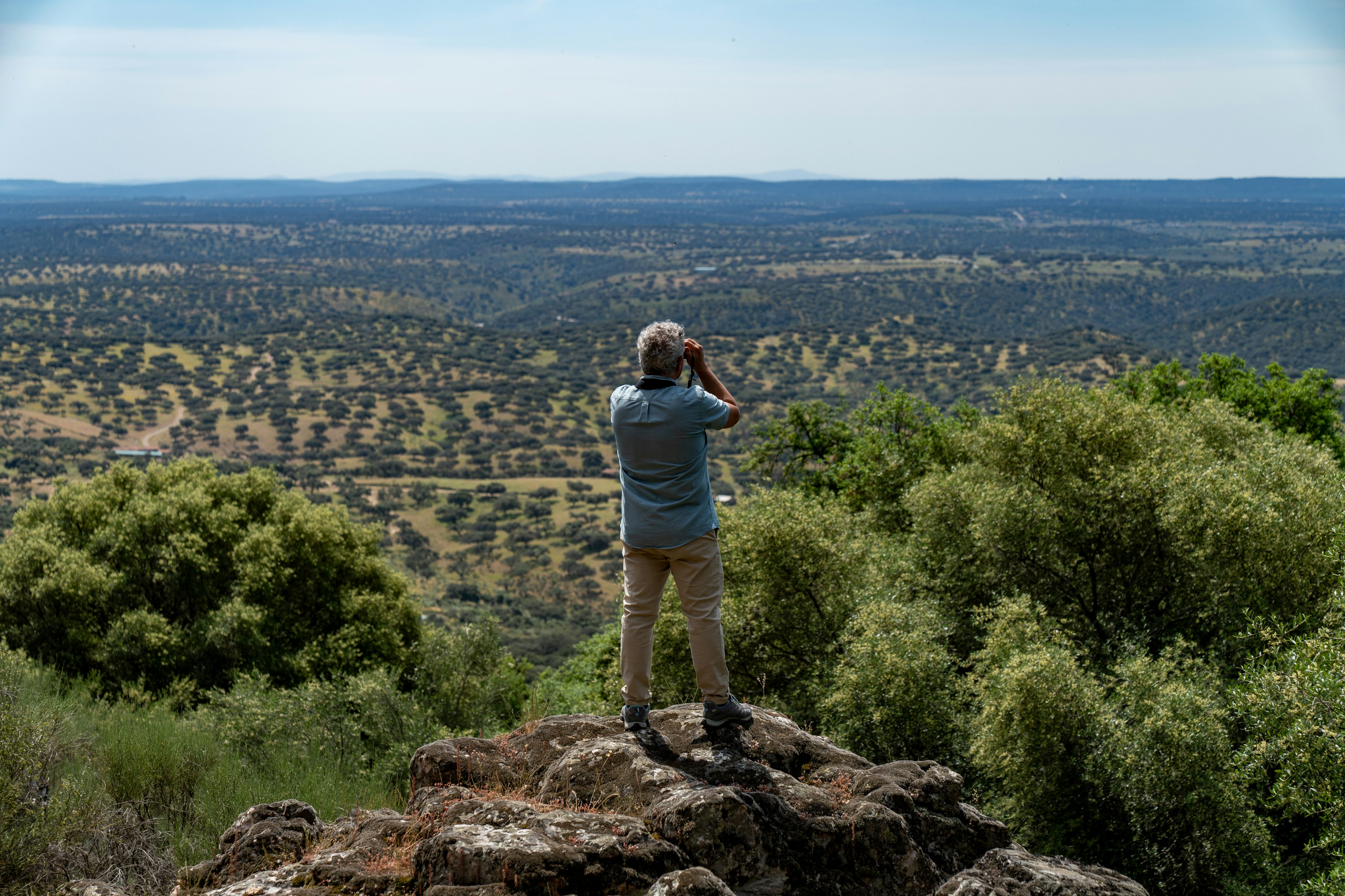Raul Virosta, an ecologist and bird expert, looks over a vista in Monfrague.